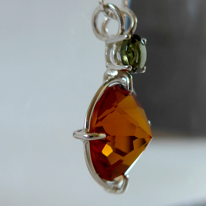 Amber and Moldavite Pendant on sale