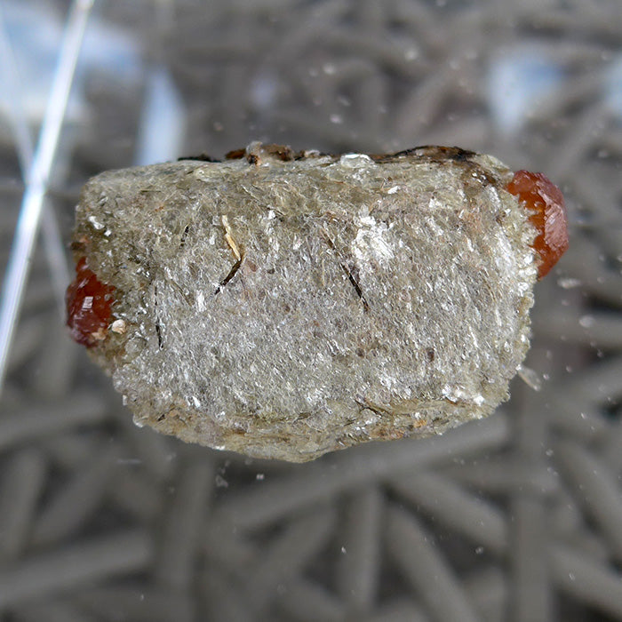 Luminous Twin Spessartine Garnets in Matrix