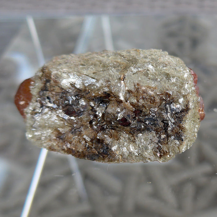 Luminous Twin Spessartine Garnets in Matrix