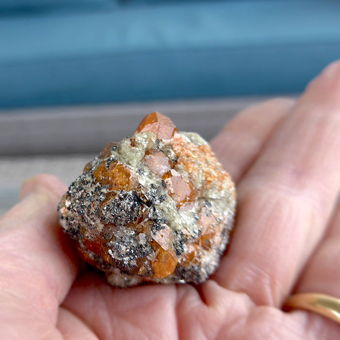 Small Orange Spessartine Garnets on Matrix