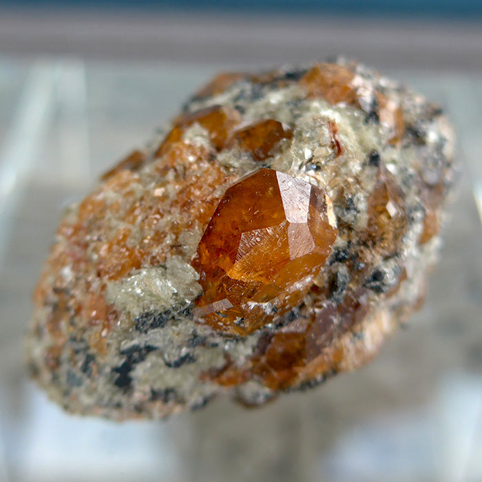 Small Orange Spessartine Garnets on Matrix